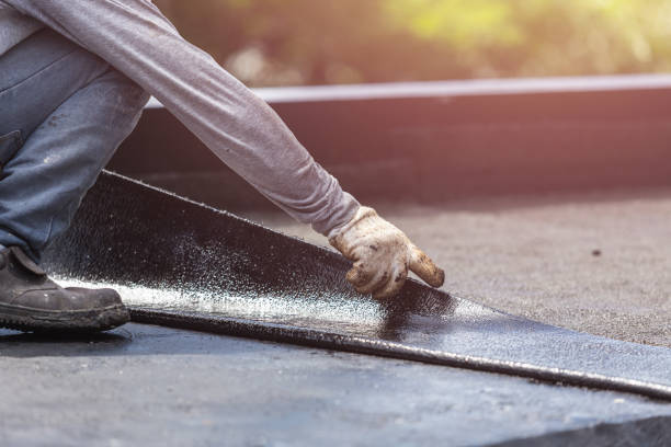 Professional Basement Waterproofing technician working in Montezuma, GA
